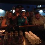 Various members enjoy a drink at the bar!